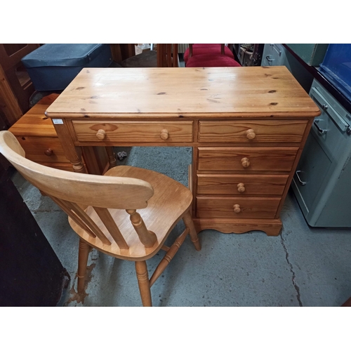 704 - A Pine 5 Drawer Dressing Table & Chair.