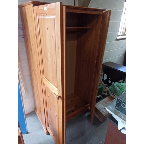 705 - A Pine Wardrobe.
173cm H x 96cm W x 58cm D