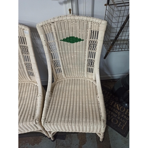 225 - A Pair Of Wicker Painted Conservatory Chairs.