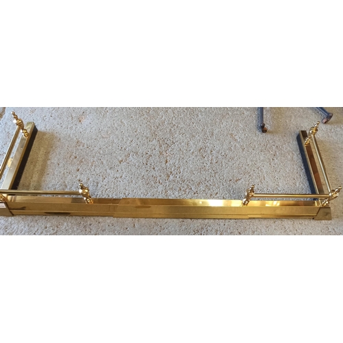 316 - An Extending Brass Fire Surround.
134cm Closed. 175cm x 40cm Open.