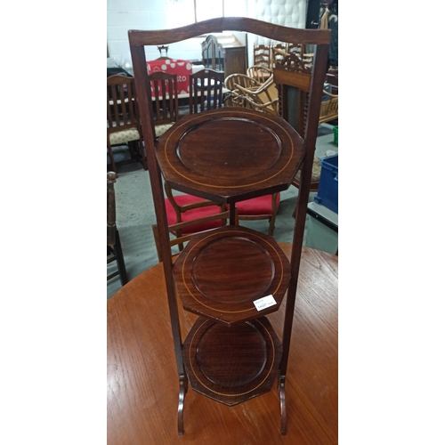 966 - A Folding Mahogany Cake Stand.