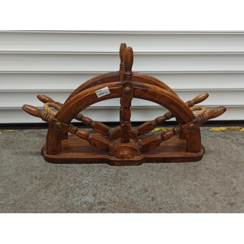 1079 - A Ships Wheel Magazine Rack.