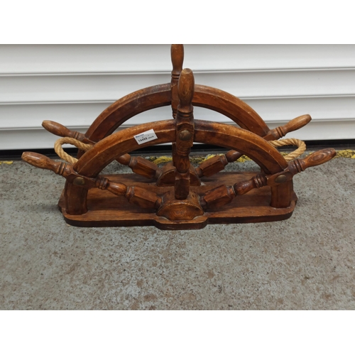 1079 - A Ships Wheel Magazine Rack.