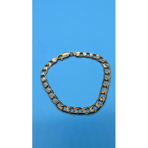 411 - A 9ct Gold Bracelet. 12.36gms.