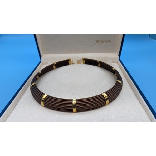 415 - An 18ct Gold Choker Necklace.
29.89gms Total Weight.