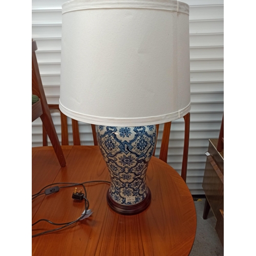 974 - A Large Ceramic Delph Style Lamp With Shade.
74cm To The Top Of Shade.