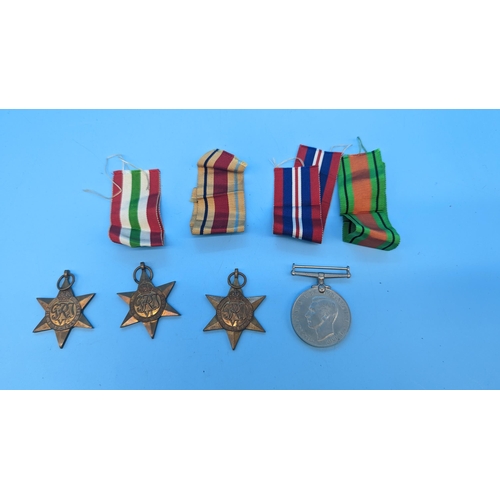 523 - WW2 Medals 1939-45, Italian And Africa Stars And Defence Medal.