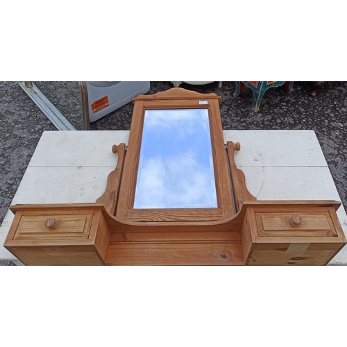 1036 - A Free Standing Pine Dressing Table Mirror With 2 Drawers.
85cm H x 91cm W x 20cm