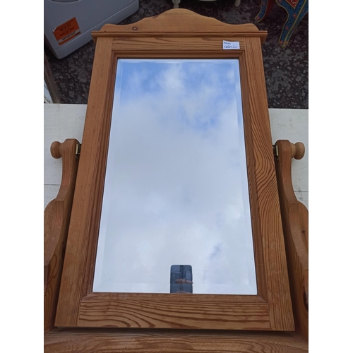 1036 - A Free Standing Pine Dressing Table Mirror With 2 Drawers.
85cm H x 91cm W x 20cm