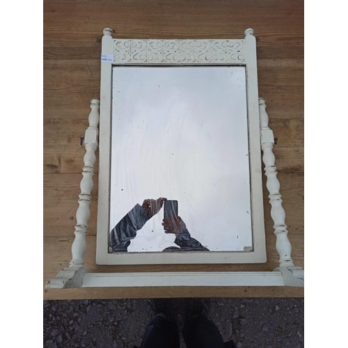 1039 - A Antique White Painted Free Standing Mirror.