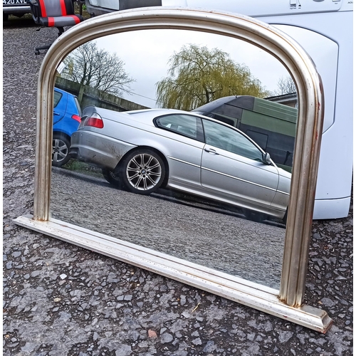 599 - A Curved Top Over Mantle Mirror.
80cm H x 120cm.