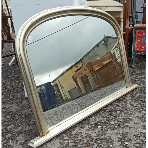 599 - A Curved Top Over Mantle Mirror.
80cm H x 120cm.