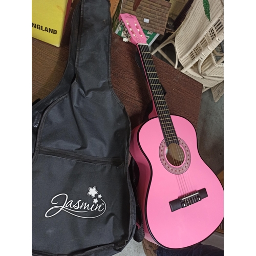 342 - A Jasmine Pink Accoustic Guitar & Case.