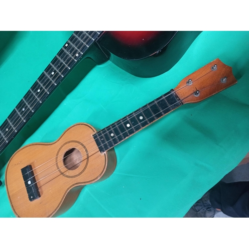 340 - A Ukulele And Guitar, Guitar Made By Stag.