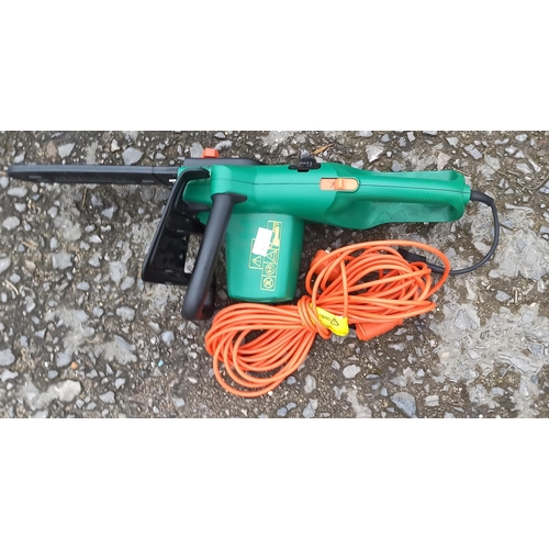 149 - An Electric Chainsaw, Black & Decker.