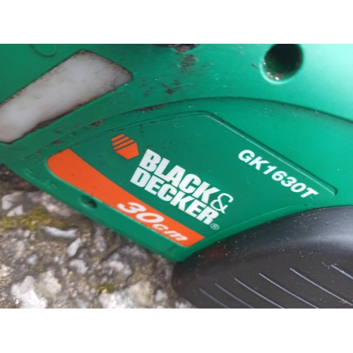 149 - An Electric Chainsaw, Black & Decker.