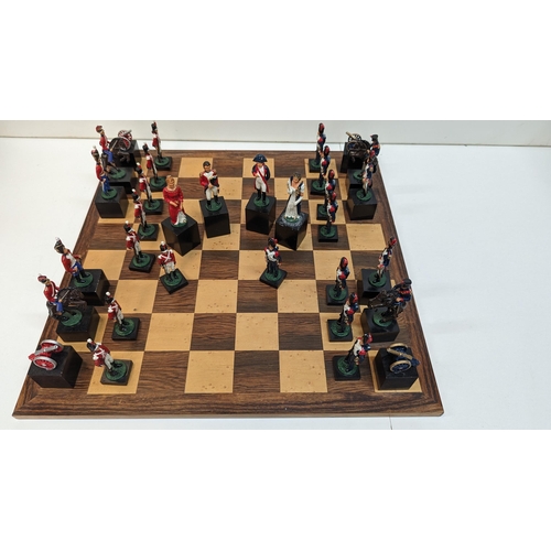 532 - A Napoleonic Chess Set with Hand Painted Metal Pieces an Board 42cm x 42cm