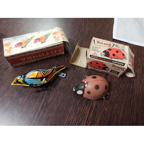 1257 - Clockwork Triang Ladybird With Box And A Russian Tin Bird With Box & Key.