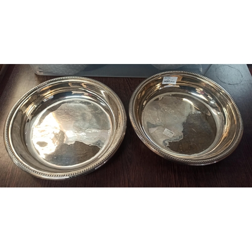 911 - A Pair of Silver plate Dishes.
50cm D x 25cm W.