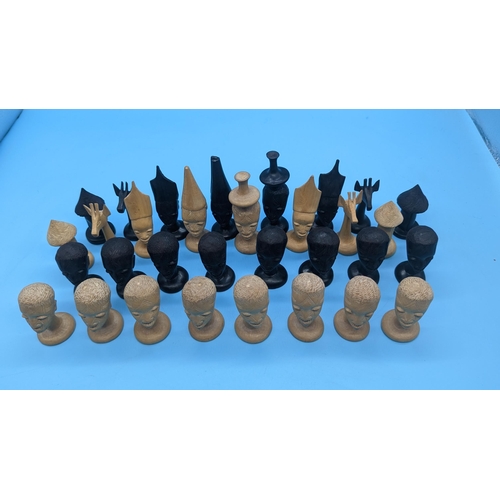 534 - A Carved Wood African Chess Set