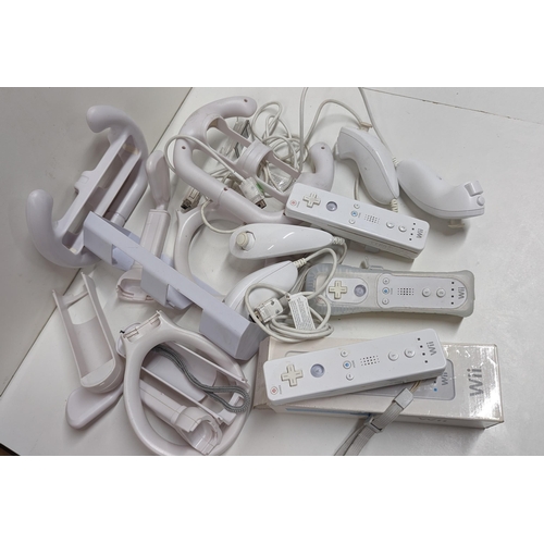 1267 - A Quantity of Nintendo Wii Controller  Nan Chucks and Accessories