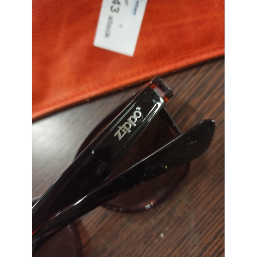 1194 - A Pair Of Zippo Sunglasses In Leather Case.