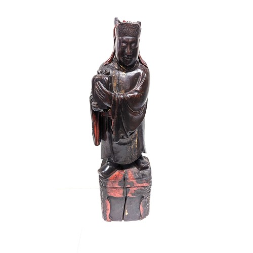 607B - A Chinese Lacquer Wood Carving of a Scholar 64cm Tall