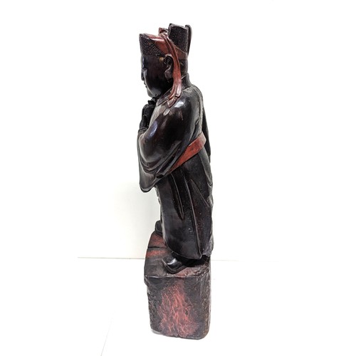 607B - A Chinese Lacquer Wood Carving of a Scholar 64cm Tall