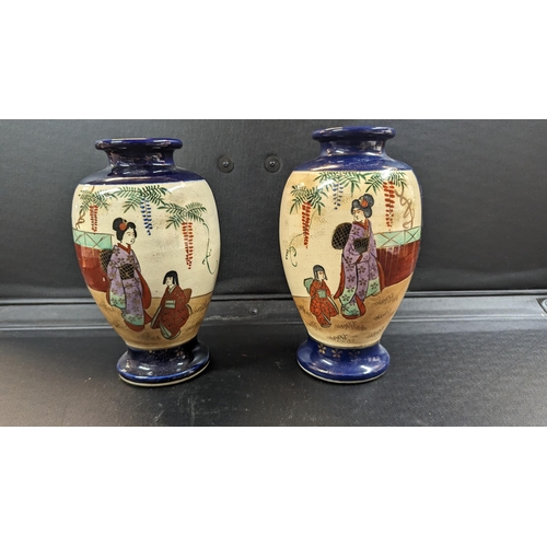 617 - A Pair of Opposing Japanese Geisha Hand Painted Vases