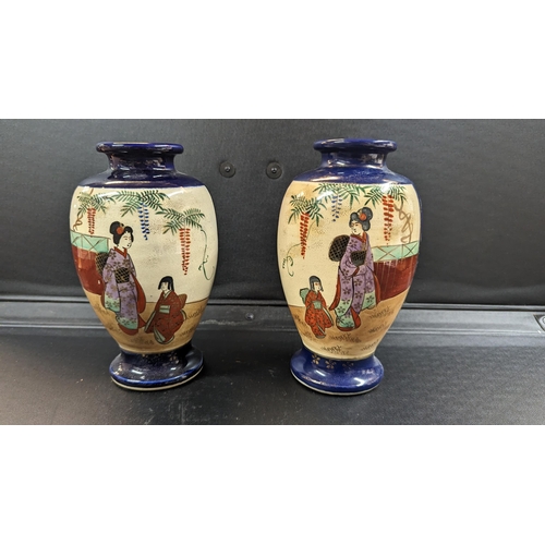 617 - A Pair of Opposing Japanese Geisha Hand Painted Vases