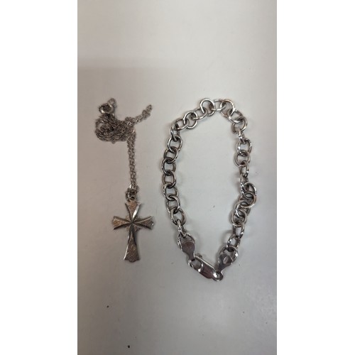 546 - A Silver Bracelet Crucifix Etc.