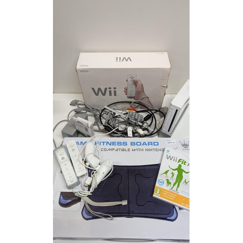 1268 - A Nintendo Wii and Compatible Balance Board