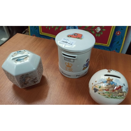 1179 - Royal Doulton Bunnykins Money Box, Crown Staffordshire Postman Pat Moneybox and a Wedgewood Peter Ra... 