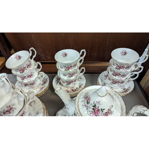 645 - A Royal Albert Lavender Rose Tea Service 12 x Cups, Saucers, Plates. Tea Pot, Milk Jug, Pot Stand, S... 