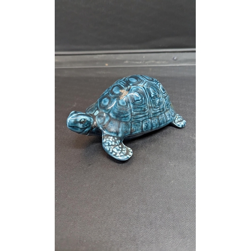 834 - A Poole Pottery Tortoise - Dolphin Blue