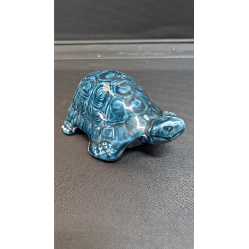 834 - A Poole Pottery Tortoise - Dolphin Blue