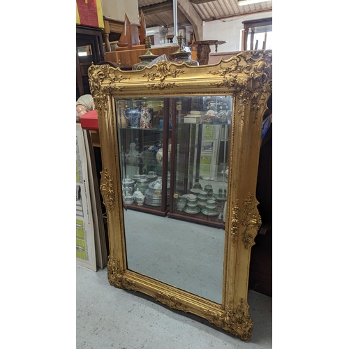 598 - An Ornate Gilt Framed Mirror 68 x 100cm