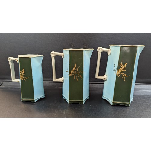 939 - A Graduated Set of Victorian Pitcher Jugs