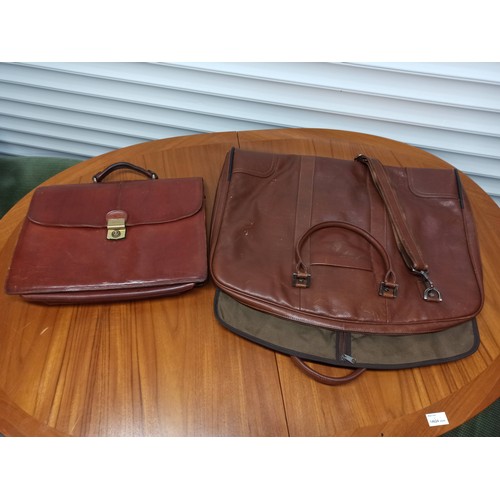 1163 - A Large Jekyll & Hide Suit Carrier & Fexier Leather Brief Case.