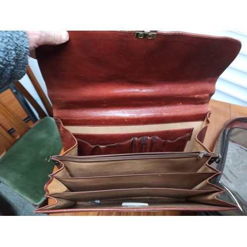 1163 - A Large Jekyll & Hide Suit Carrier & Fexier Leather Brief Case.