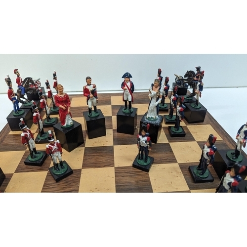 532 - A Napoleonic Chess Set with Hand Painted Metal Pieces an Board 42cm x 42cm