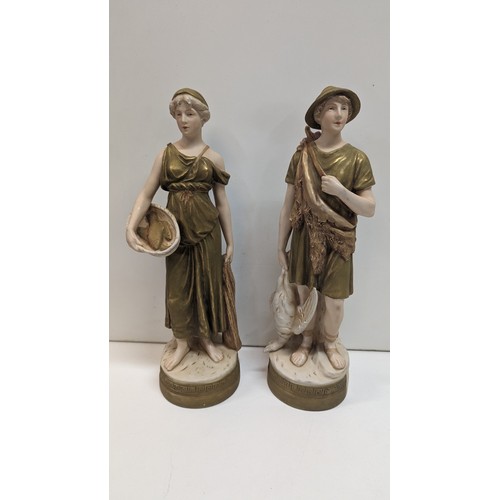 399 - A Pair of Antique Royal Dux Classical Figures of a Young Man Carrying a Goose and Young Girl Carryin... 