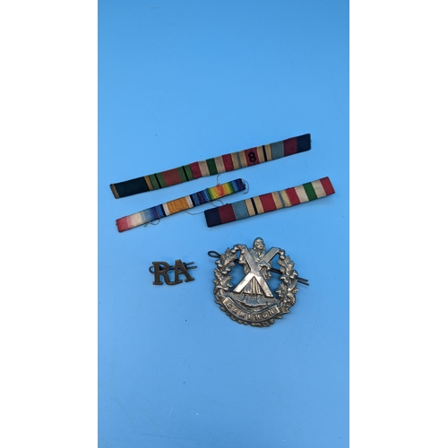 524 - Queens Militaria Own Highlanders Cap badge, Royal Artillery Lapel Badge And Colours.