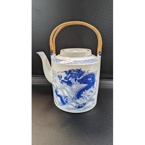 608 - A Large Blue & White Chinese Wedding Teapot Featuring Dragons and Koi Carp 35cm h x 26cm Diameter