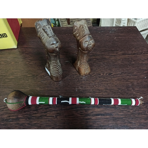 818 - A Pair Of Carved Wooden Ndebele Long Necked African Heads And a Fertility Stick.