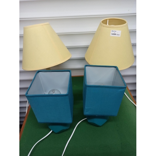 984 - A Pair of Yellow Bedside Lamps & A Pair Of Turquoise Bedside Lamps.