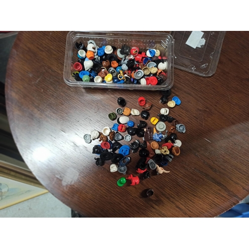 1253 - A Tub Of Lego Figure Hats etc.