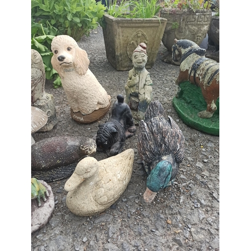 68 - Selection of Garden Ornaments including Otter, Owls, Dogs, Ducks, Badger Rabbit and Frogs  ( x 12)