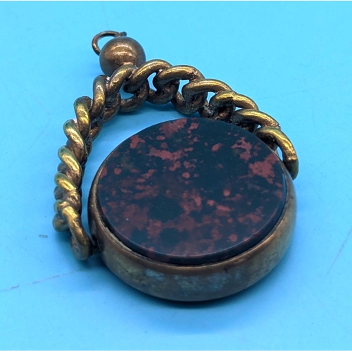 412 - A Large Gilt Carnelian / Blood Stone Rotating Watch Fob