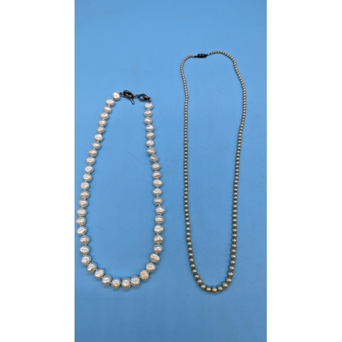 468 - 2 x Pearl Necklaces with .925 Silver Clasps